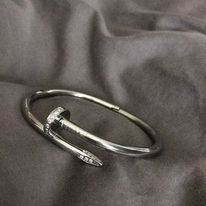 Silver nail bracelet with rhinestones